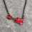 red guitar necklace